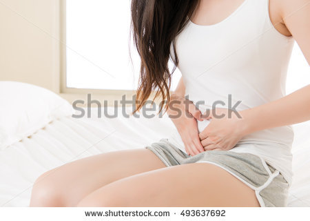 stock-photo-beautiful-asian-woman-suffering-from-stomach-pain-at-home-on-bed-bedroom-background-physiological-493637692.jpg