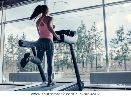 attractive-young-sports-woman-working-450w-723094507.jpg