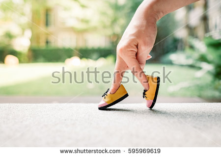 stock-photo-woman-hand-finger-walking-with-shoe-concept-595969619.jpg