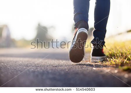 stock-photo-close-up-of-girl-shoes-walking-514540603.jpg