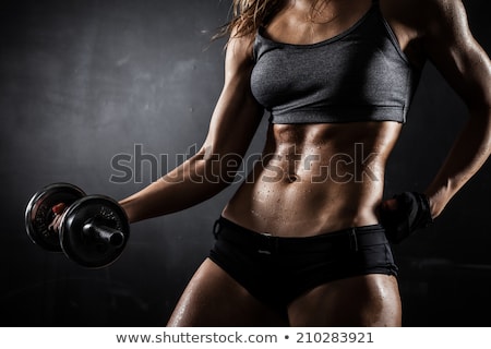 brutal-athletic-woman-pumping-muscles-450w-210283921.jpg