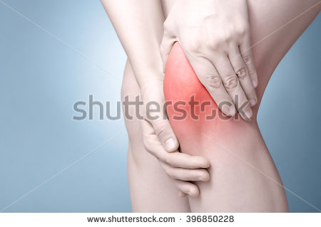 stock-photo-a-young-woman-massaging-her-painful-knee-396850228.jpg