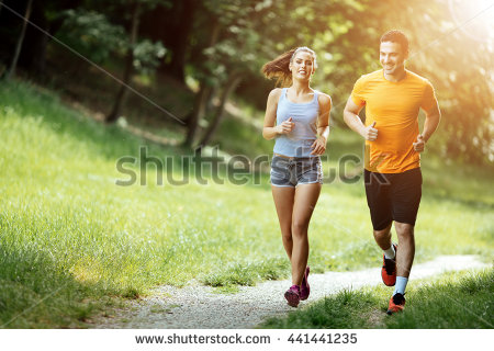 stock-photo-beautiful-couple-jogging-in-nature-living-healthy-441441235.jpg