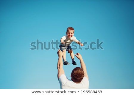 summertime-happy-joyful-child-father-450w-196588463.jpg