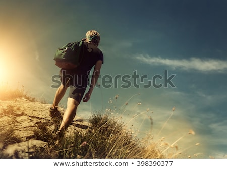 man-climb-on-mountain-hill-450w-398390377.jpg