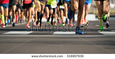 stock-photo-marathon-running-in-the-light-of-evening-516907939.jpg