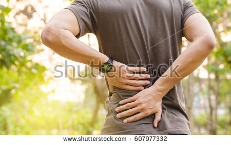 stock-photo-sport-injury-man-with-back-pain-607977332.jpg