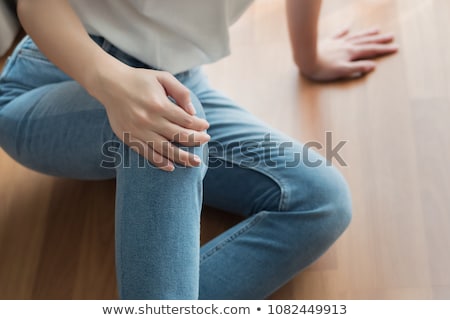 injured-woman-broken-knee-leg-450w-1082449913.jpg