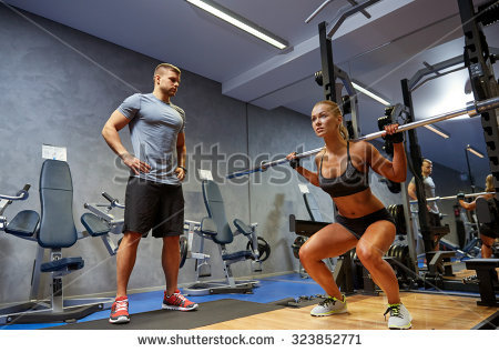 stock-photo-sport-fitness-bodybuilding-lifestyle-and-people-concept-man-and-woman-with-bar-flexing-muscles-323852771.jpg