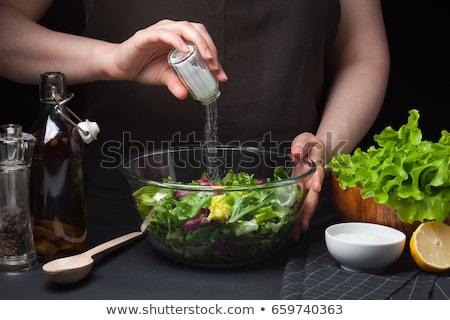 woman-chef-kitchen-preparing-vegetable-450w-659740363.jpg