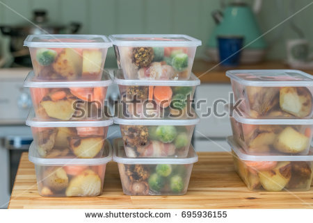 stock-photo-meal-prep-stack-of-home-cooked-roast-chicken-dinners-in-containers-ready-to-be-frozen-for-later-695936155.jpg