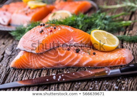 raw-salmon-fillets-pepper-salt-450w-566639671.jpg