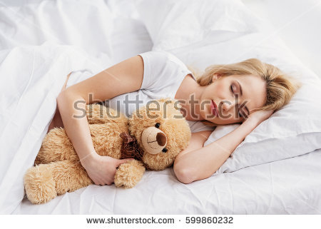 stock-photo-young-expectant-mother-resting-in-bedroom-599860232.jpg