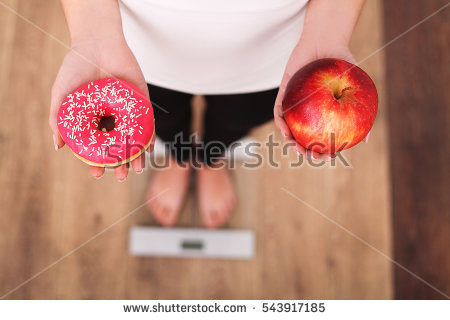 stock-photo-diet-woman-measuring-body-weight-on-weighing-scale-holding-donut-and-apple-sweets-are-unhealthy-543917185.jpg