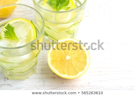 water-cucumber-lemon-ice-450w-565263610.jpg
