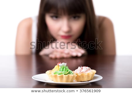 young-dieting-woman-sitting-front-450w-376561909.jpg