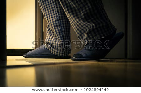 adult-man-pajamas-walks-bathroom-450w-1024804249.jpg