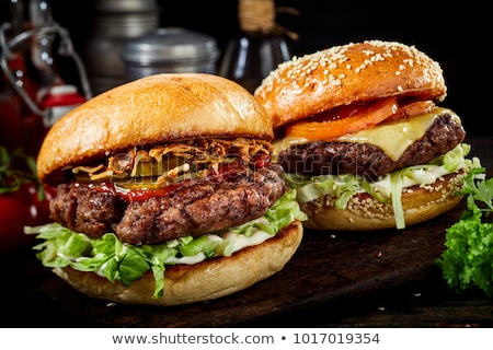 two-delicious-beef-burgers-salad-450w-1017019354.jpg