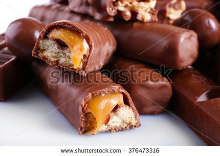 stock-photo-mix-of-chocolate-on-table-close-up-376473316.jpg