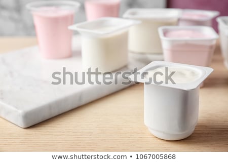 plastic-cup-tasty-yogurt-on-450w-1067005868.jpg