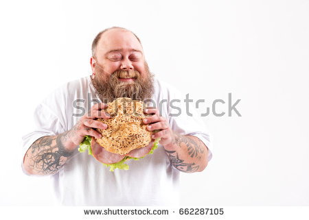 stock-photo-joyful-thick-guy-eating-big-bun-with-meat-662287105.jpg